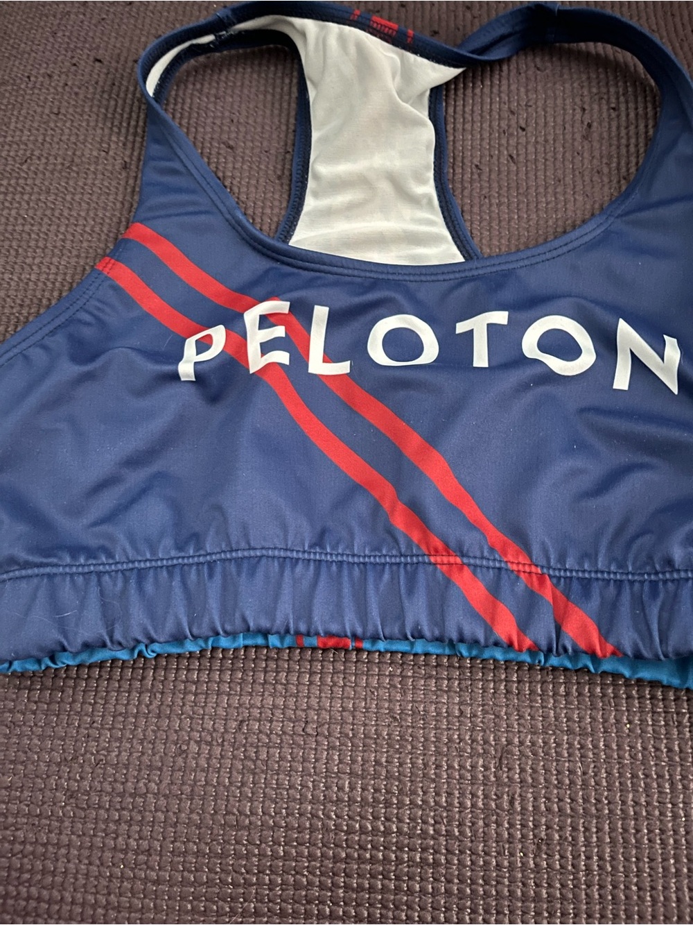 Peloton Navy Sports Bra with Red Stripes and White Logo